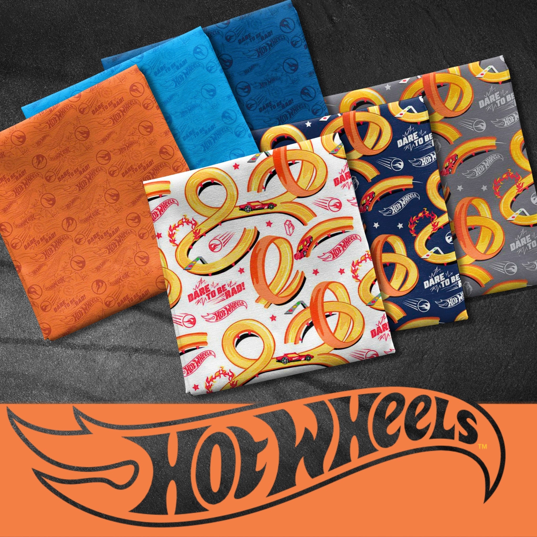 Hot Wheels cars, logos and race tracks on orange, blue, navy, grey fabric and white for boys quilts
