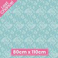 Aqua quilting cotton with a delicate white pattern of floral stems and berries