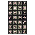 Quilting panel with 24 blocks of blush pink magnolias framed on a black background
