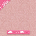 Tonal blender fabric in light coral pink with elegant, detailed scrollwork for quilting patchwork sewing