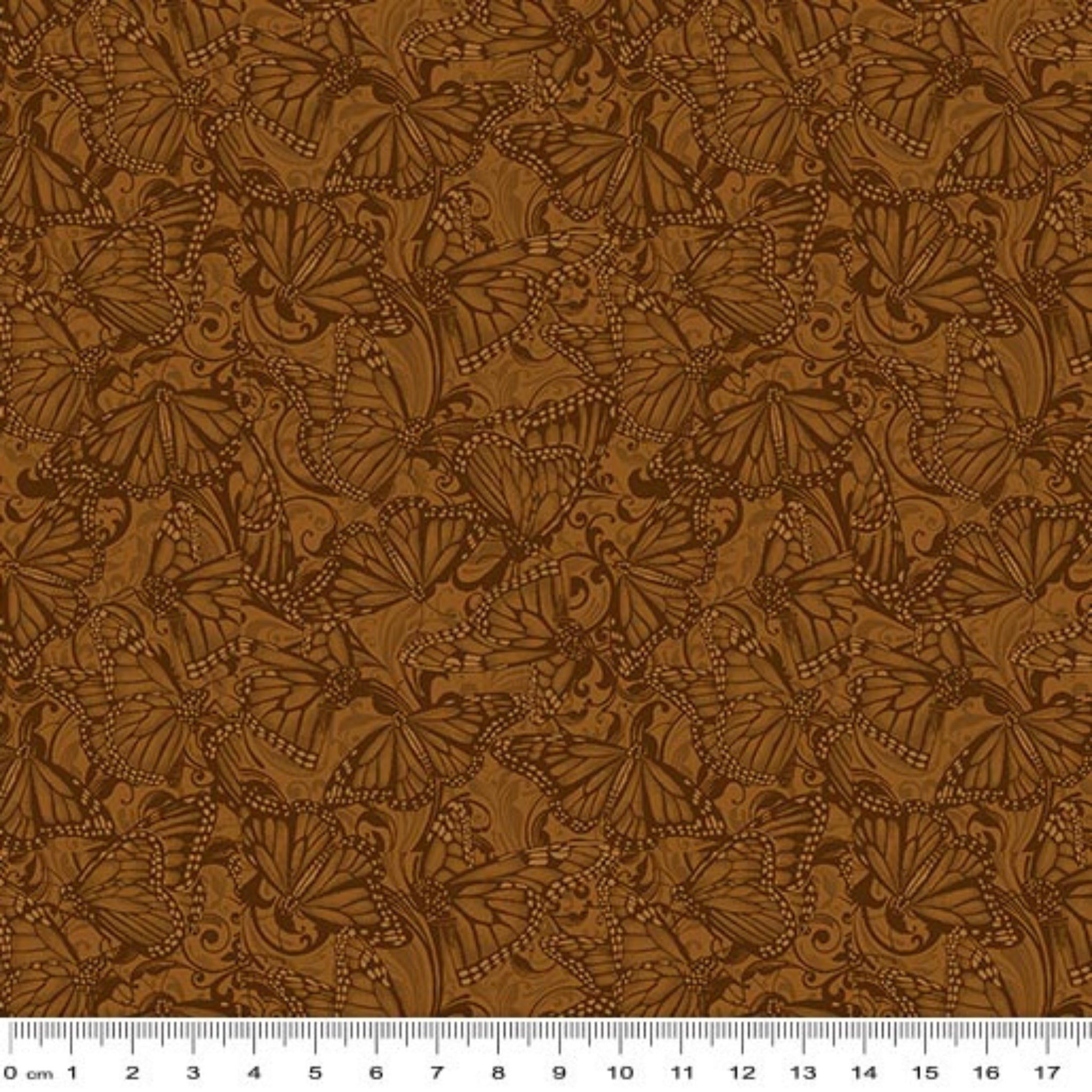 Tonal quilting fabric with detailed Monarch butterflies and scrollwork pattern in cinnamon brown