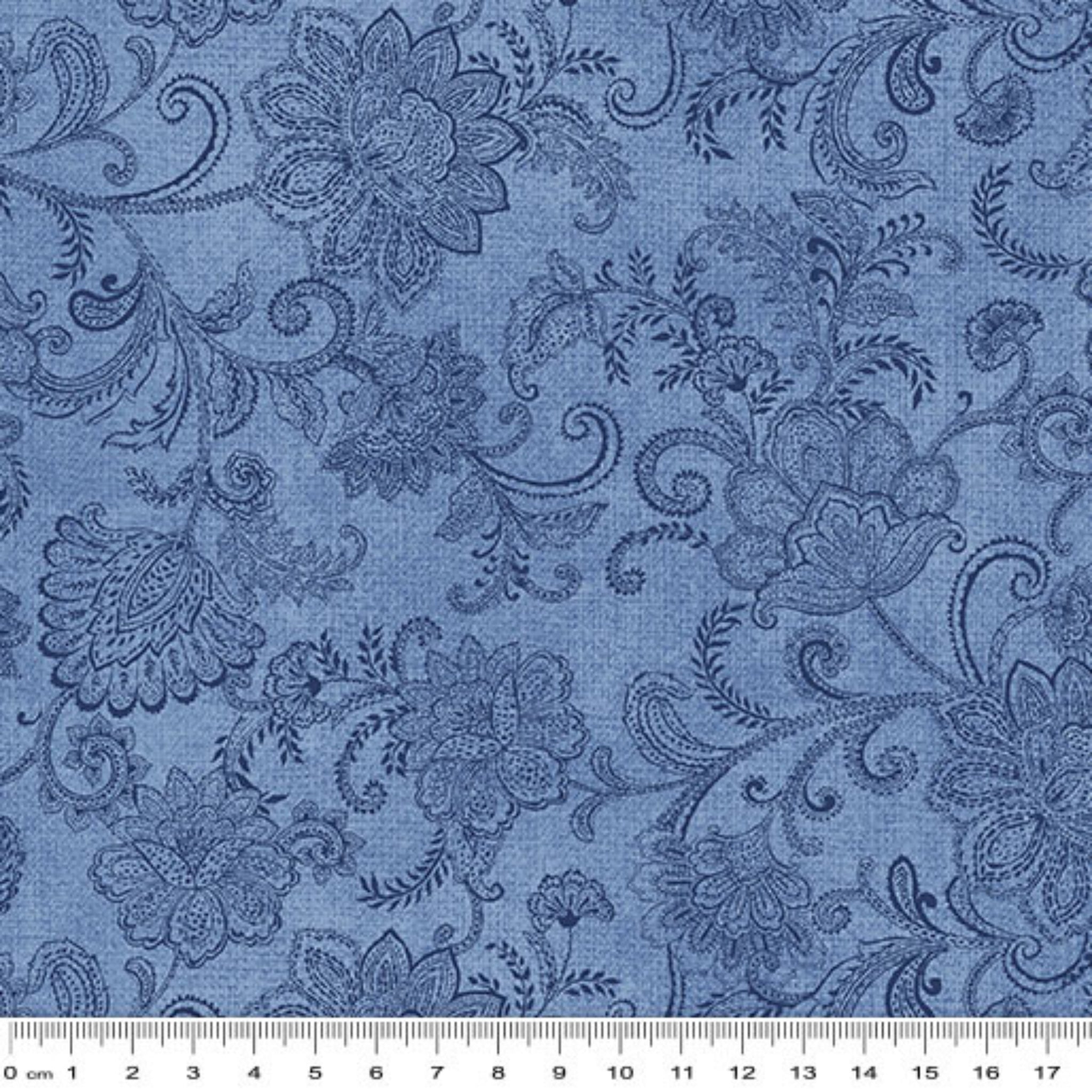 Tonal medium blue quilting fabric with a detailed all-over Jacobean floral paisley pattern
