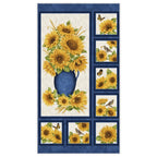 Quilting panel of sunflower bouquet in blue vase, framed by blocks of flowers, birds and butterflies