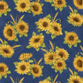Quilting fabric with bright yellow sunflowers and wheat sheaves on a deep indigo blue background