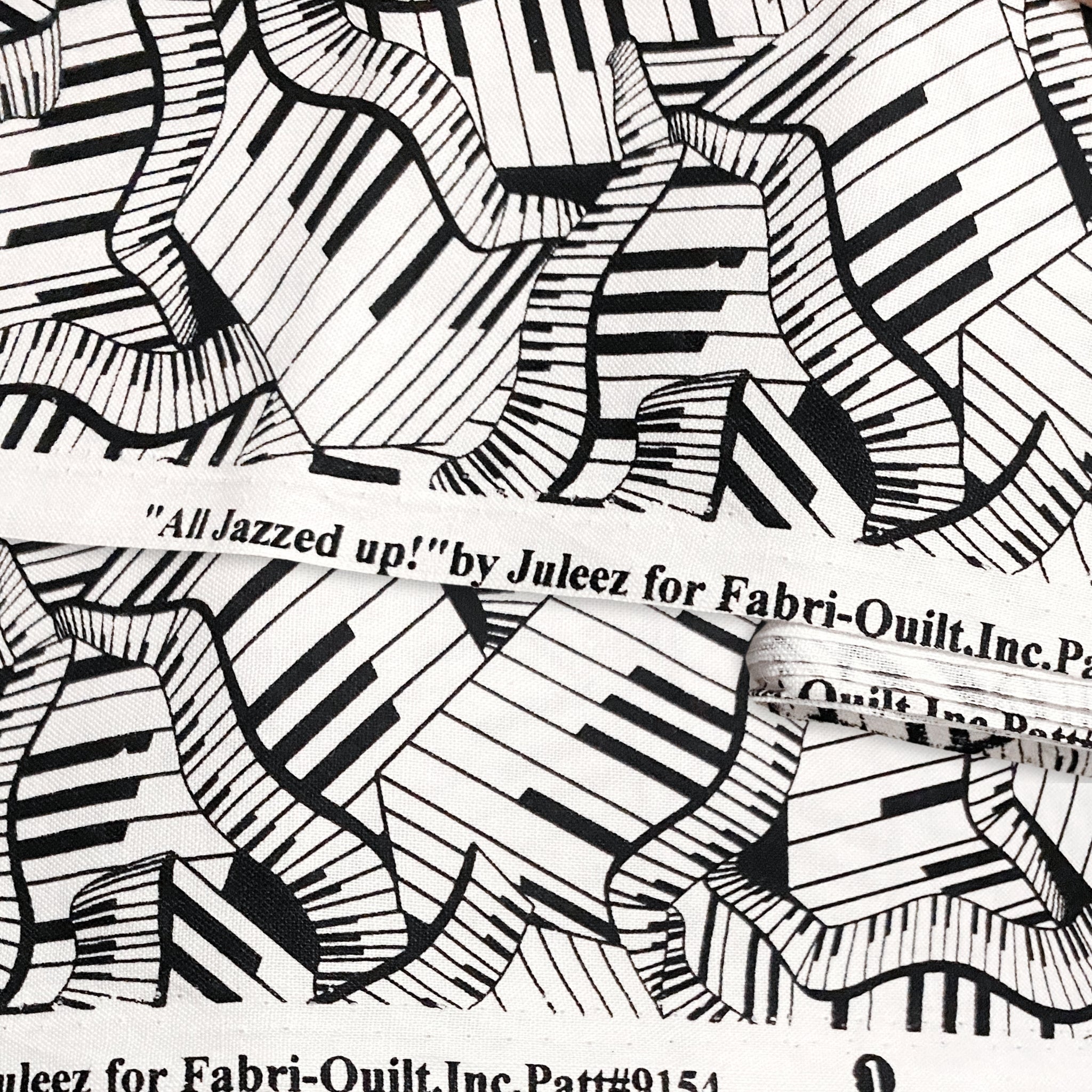 Wavy piano keys novelty black white fabric for music quilts music teacher gifts and musician sewing projects