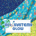 All Systems Glow fabric glow-in-the-dark rockets, stars, and planets in blue and green