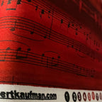 Screen printed vintage piano sheet music red Kona cotton bolt with Robert Kaufman selvedge music novelty fabric for quilts and sewing