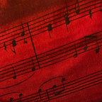 Screen printed vintage piano sheet music close-up red black Kona cotton weave music novelty fabric for quilts and patchwork sewing