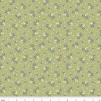 Tiny blue roses white blossoms scattered sage green ditsy quilting cotton Anne of Green Gables licensed fabric for quilts cushion covers and vintage floral sewing projects