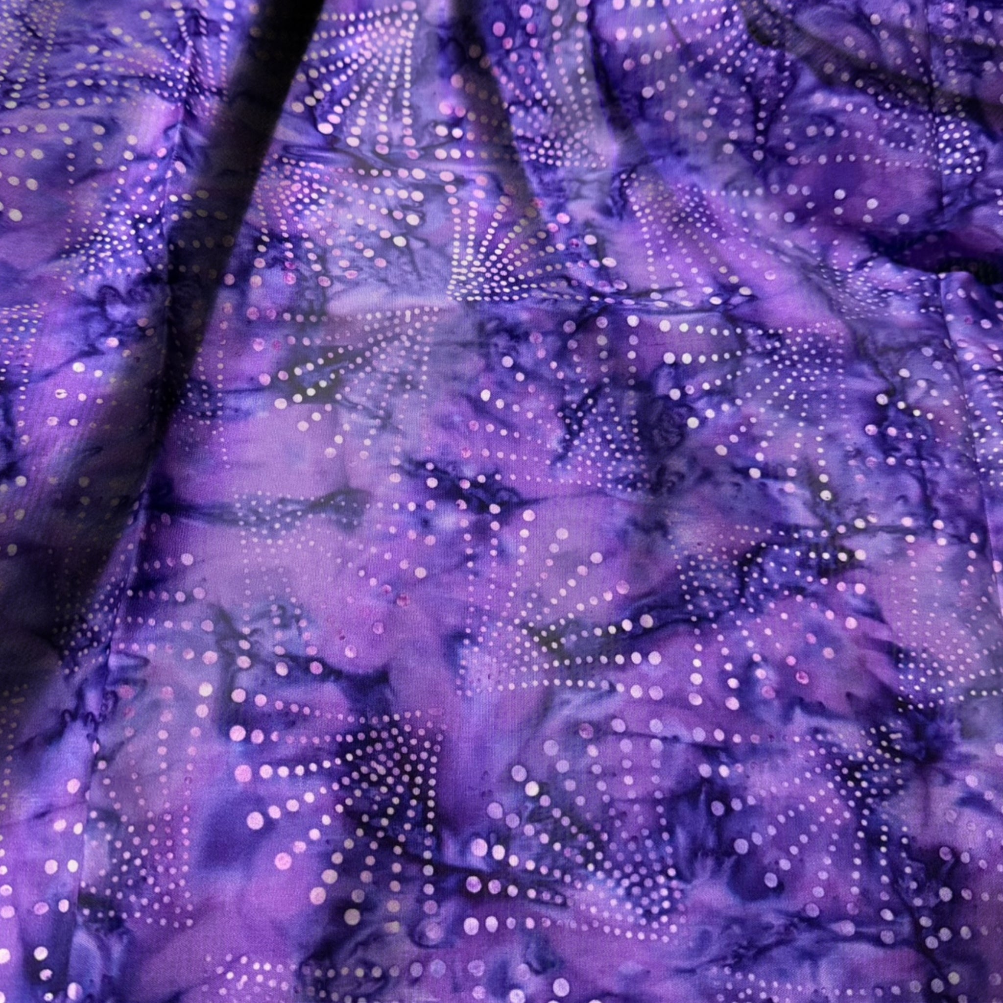 Radiating dots arcs purple batik quilting fabric blender for patchwork quilts and sewing projects