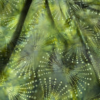 Radiating dots arcs green batik quilting fabric blender for patchwork quilts and sewing projects