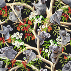 Realistic koalas eucalyptus trees red white gumnut blossoms green leaves black fabric for Australian themed quilts wildlife gifts and flora fauna patchwork sewing projects