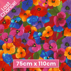 Packed pansy print red orange pink purple blue yellow floral fabric for feature quilts bags and vibrant patchwork sewing projects