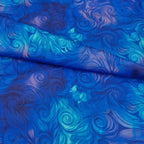 Swirling feathered scroll digital print cobalt blue turquoise blender fabric for feature quilts sashing and patchwork sewing projects
