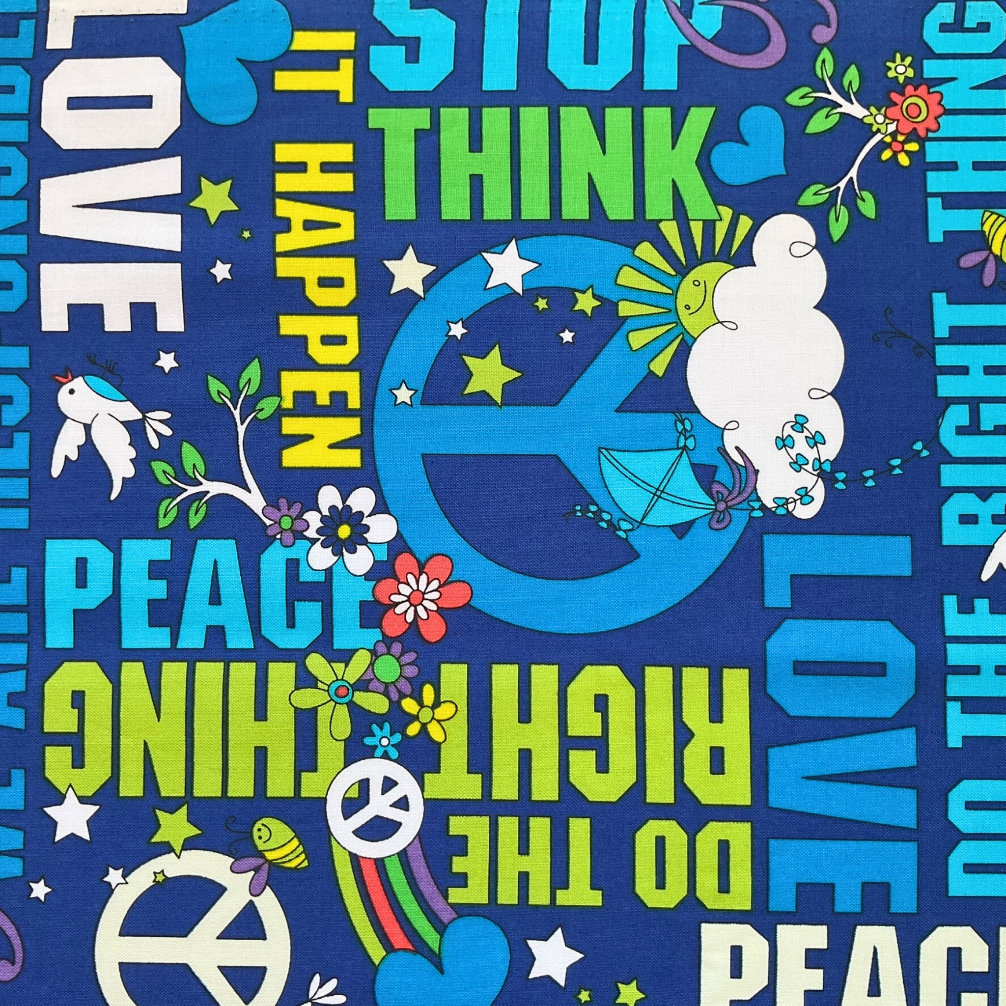 Hippie peace words royal blue fabric for 60s 70s themed quilts bags patchwork sewing projects