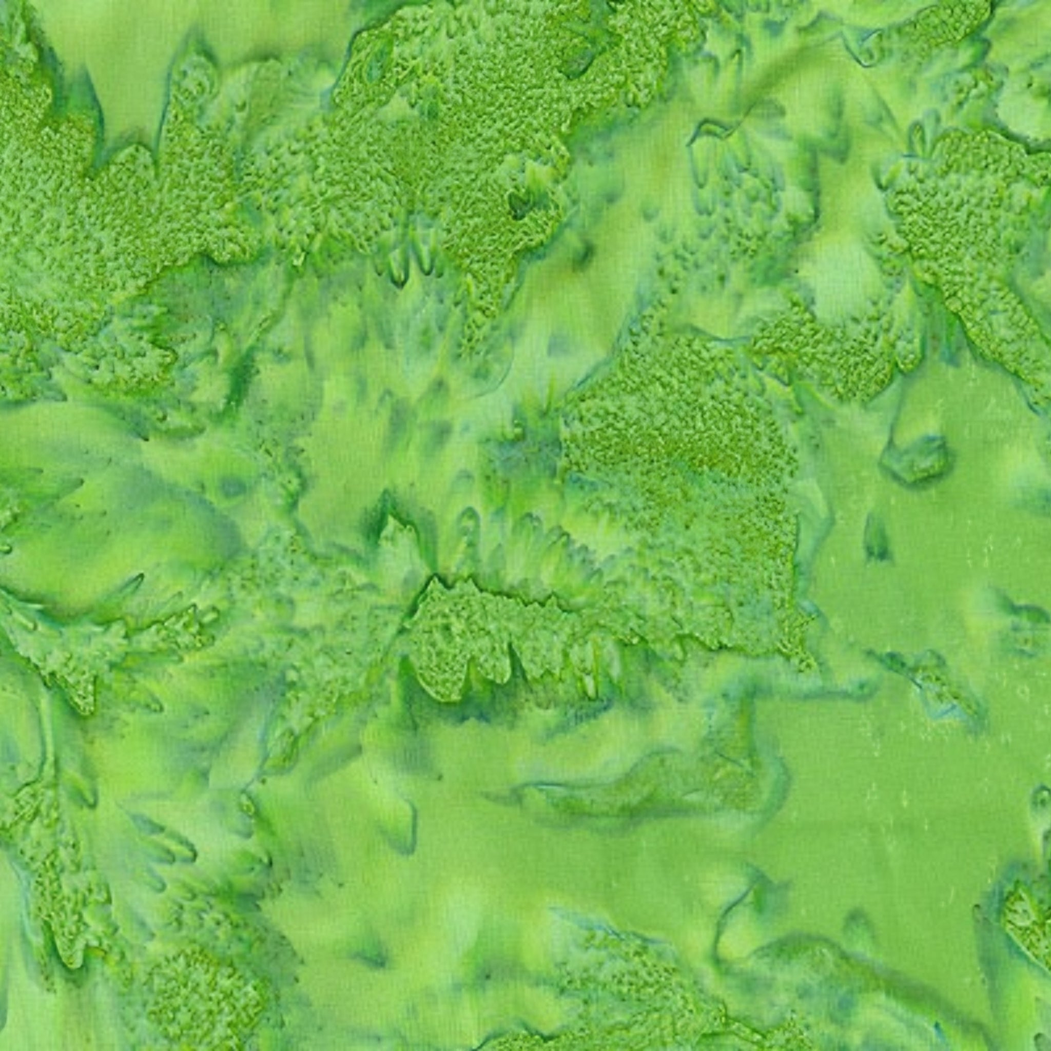 Bright kelly bamboo green mottled batik blender fabric with lime and forest green undertones for quilt backgrounds sashing and scrappy batik quilts