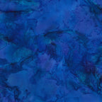 Deep violet blue mottled batik blender fabric with teal purple and navy undertones for quilt backgrounds sashing and scrappy batik quilts