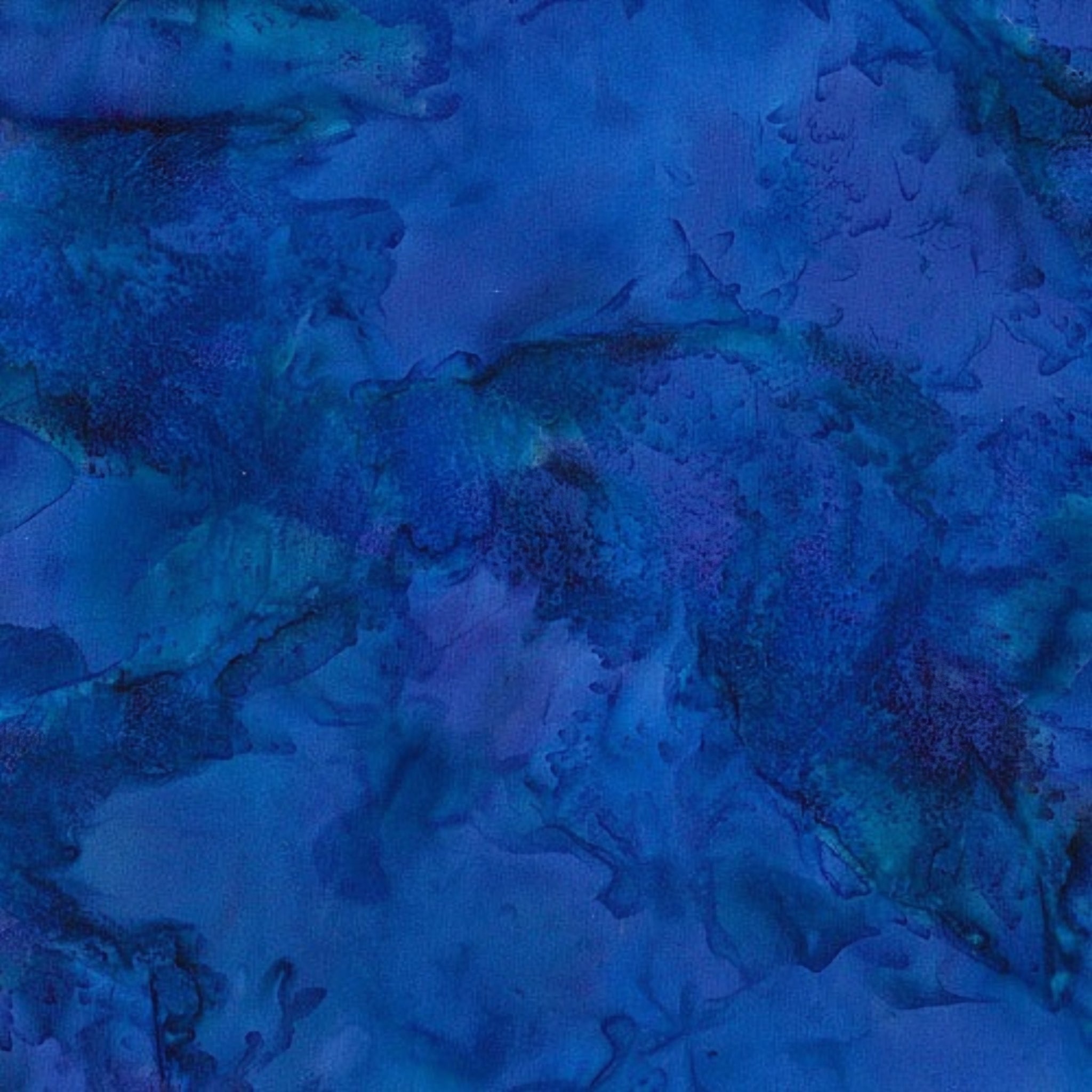 Deep violet blue mottled batik blender fabric with teal purple and navy undertones for quilt backgrounds sashing and scrappy batik quilts