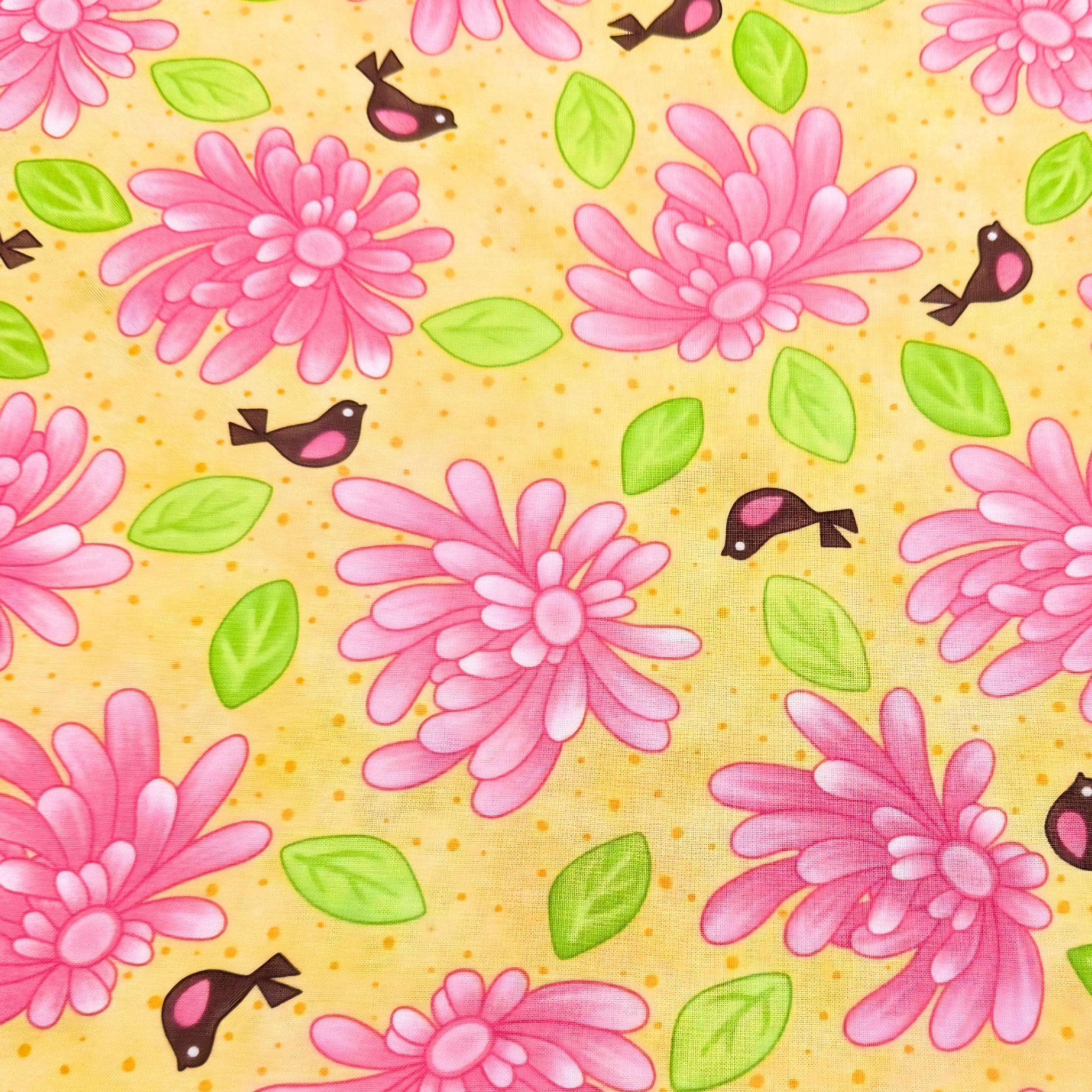 Novelty pink daisy flowers tiny birds and green leaves on yellow quilting cotton for children's quilts girls and kids patchwork