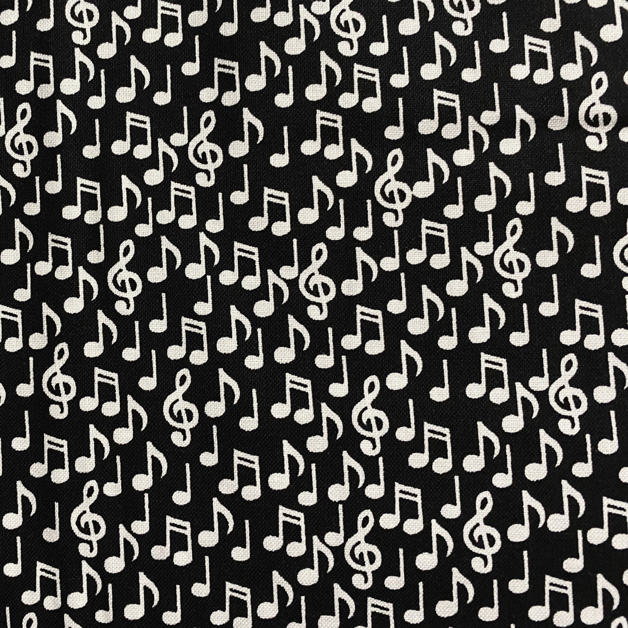 Tossed music notes quavers treble g clefs eighth notes white black novelty music fabric for music lovers quilts teacher gifts bags and patchwork sewing
