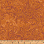Swirling marbled burnt orange rust blender fabric for autumn desert quilts backgrounds sashing and patchwork projects