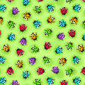 Novelty multicolour ladybugs tossed lime green fabric for children's quilts and kids novelty patchwork projects