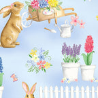 Cute brown bunnies spring garden blue fabric with potted flowers butterflies picket fences watering cans for children's quilts Easter projects and nursery décor
