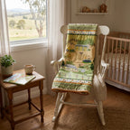 Handmade Burrangong Farm panel quilt with homestead tractor kangaroos and farm borders draped over a nursery rocking chair