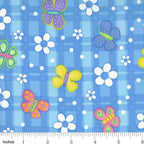 Novelty multicolour butterflies and white daisies on blue gingham quilting cotton for children's quilts girls and kids patchwork