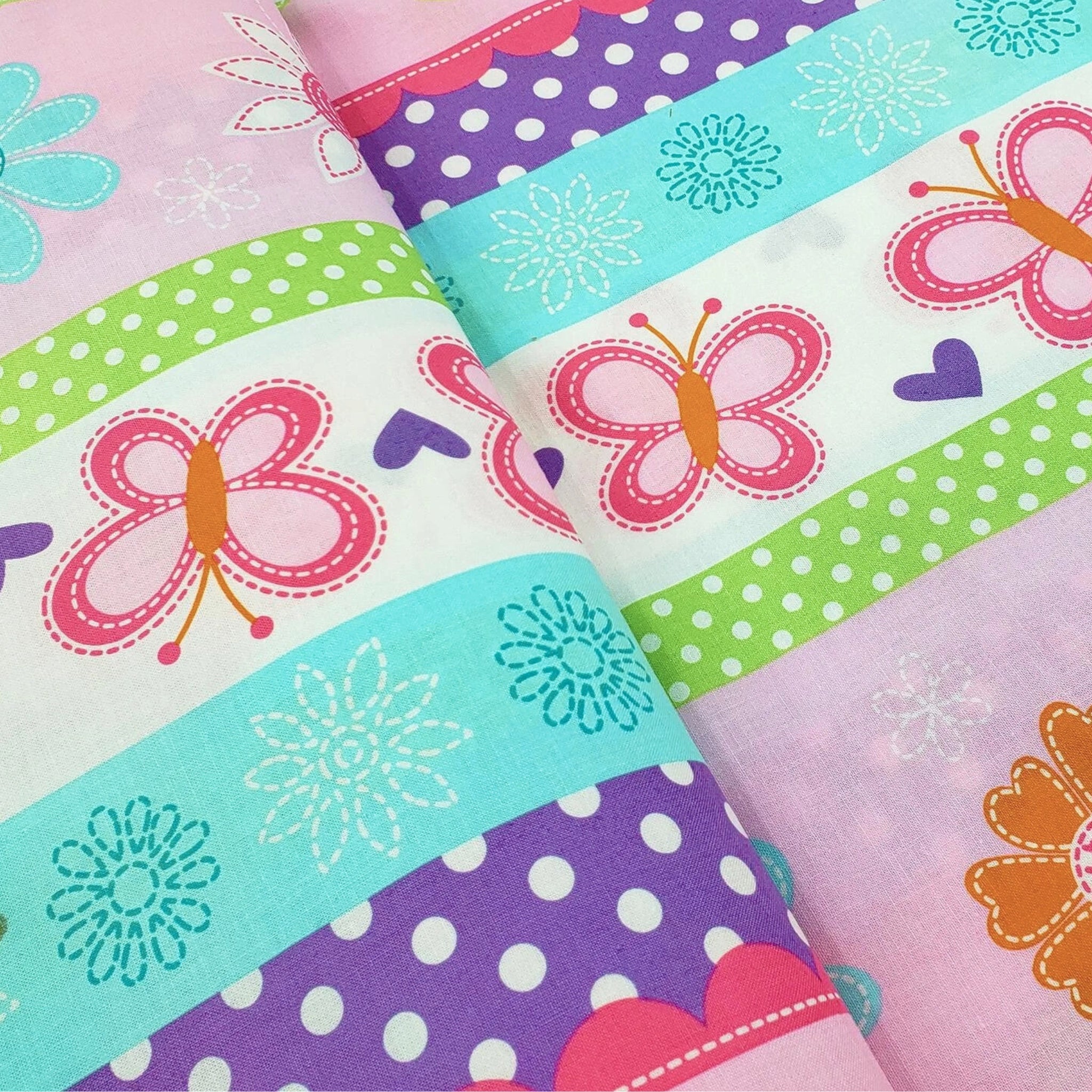 Butterfly flowers border stripe pink purple aqua novelty fabric for children's quilts girls' quilts and patchwork sewing projects