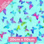 Watercolour butterflies in aqua blue magenta lime green fabric for modern quilts and patchwork sewing projects