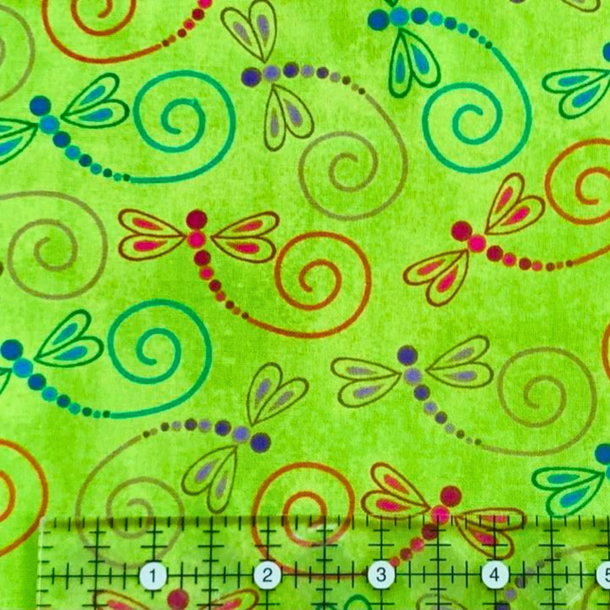 Novelty dragonfly swirl lime green fabric red orange teal pink purple for nature quilts children's projects and garden gifts