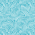 Tonal light teal fabric with an all-over patterned texture of swirling small and large teal beads