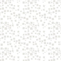 Tonal white fabric with an all-over pattern of scattered light grey and white geometric squares
