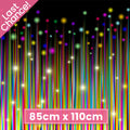 Rainbow star double border print in vibrant colours on black fabric for holiday quilts and patchwork sewing projects