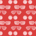 Colourful sunglasses on red cotton fabric for beach quilts, summer tote bags and coastal sewing projects