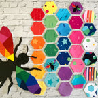 Create Kristy Lea Quiet Play Riley Blake rainbow fabric collection hexagon display with stars stripes geometric prints