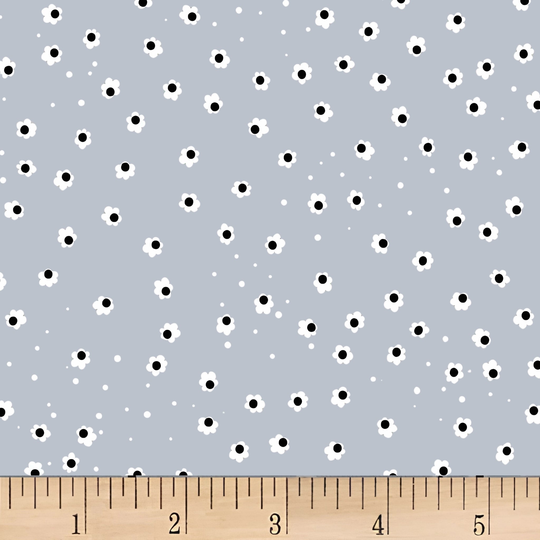 Small white daisies black centres scattered on soft blue-grey background floral blender quilting fabric for baby quilts patchwork tote bags and children's sewing