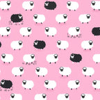 White and black sheep tossed flock pink background novelty quilting fabric for baby quilts nursery décor girls projects and children's sewing
