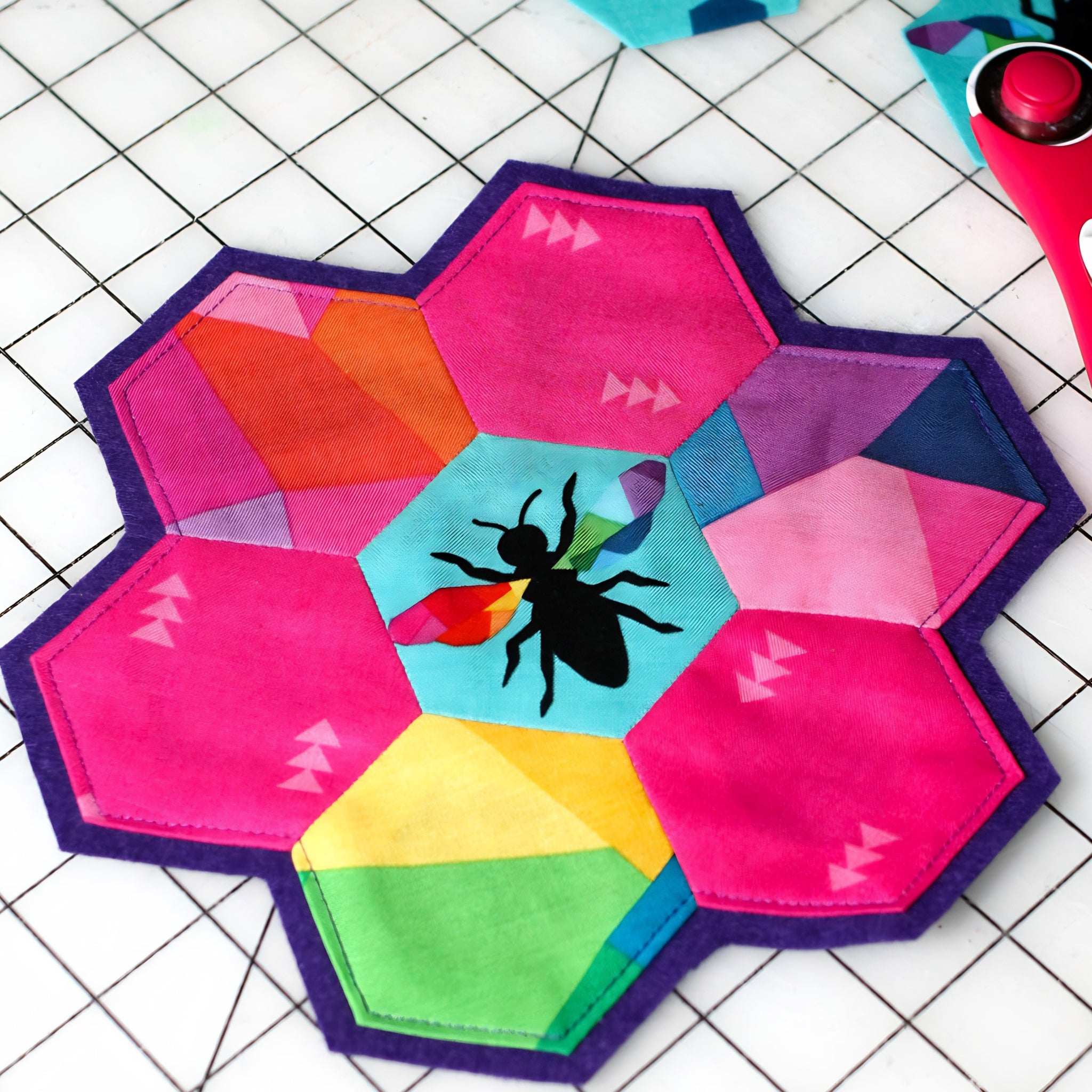 Create Kristy Lea Quiet Play Riley Blake rainbow hexagon flower patchwork project with bee fabric