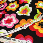 Groovy mod daisy floral black multi fabric for retro quilts tote bags cushions patchwork projects