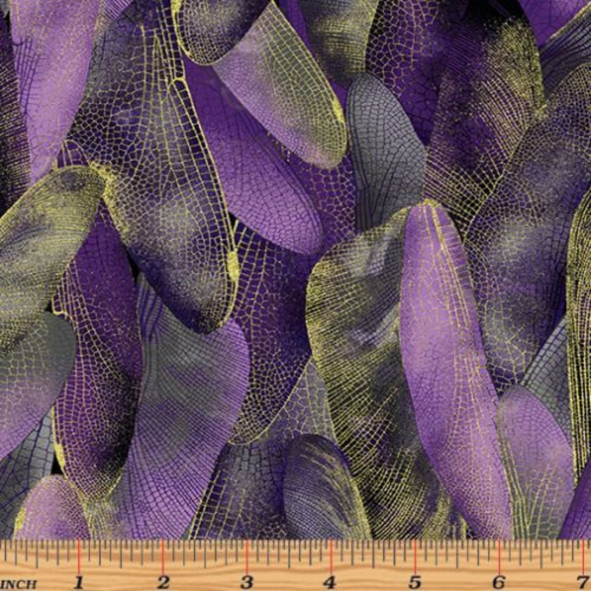 Deep purple and violet quilting fabric with a pattern of metallic gold dragonfly wings