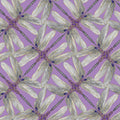 Lavender, grey, and violet geometric fabric with a dragonfly pinwheel design