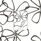 Me and My Sister abstract flower outlines black white fabric for modern quilts and contemporary patchwork sewing projects