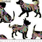 White fabric with large, decorative dog silhouettes in vibrant paisley and gold metallic