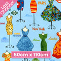 Vintage dresses on ornate dress stands Paris London New York Milano city names sky blue novelty quilting fabric patchwork sewing projects
