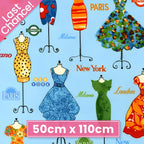 Vintage dresses on ornate dress stands Paris London New York Milano city names sky blue novelty quilting fabric patchwork sewing projects