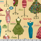 Vintage dresses on ornate dress stands Paris London New York Milano city names pale yellow pink teal green novelty quilting fabric patchwork projects