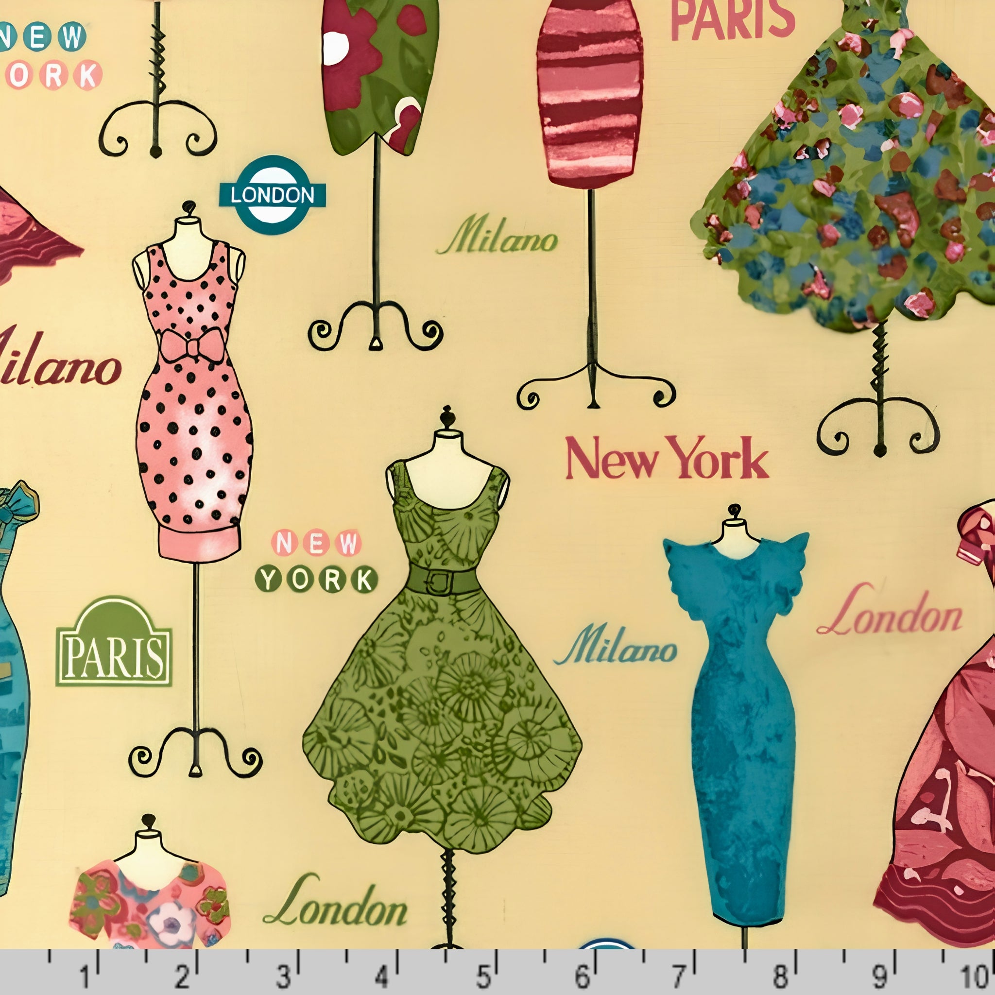 Vintage dresses on ornate dress stands Paris London New York Milano city names pale yellow pink teal green novelty quilting fabric patchwork projects