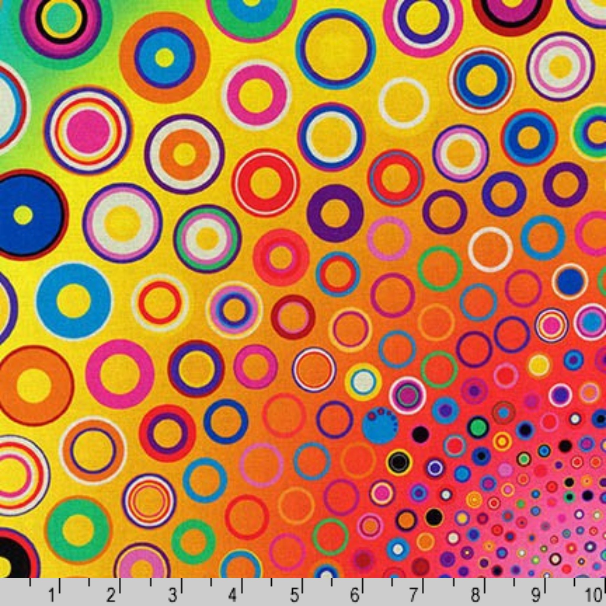 Radiating circle panel rainbow colours pink orange yellow green blue fabric for quilt centrepiece wall hanging and patchwork sewing projects